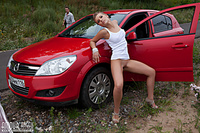 Naked erotic girls free pictures posing near car