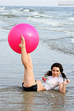 Cute angel on the beach