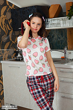 Stripping off her jammies